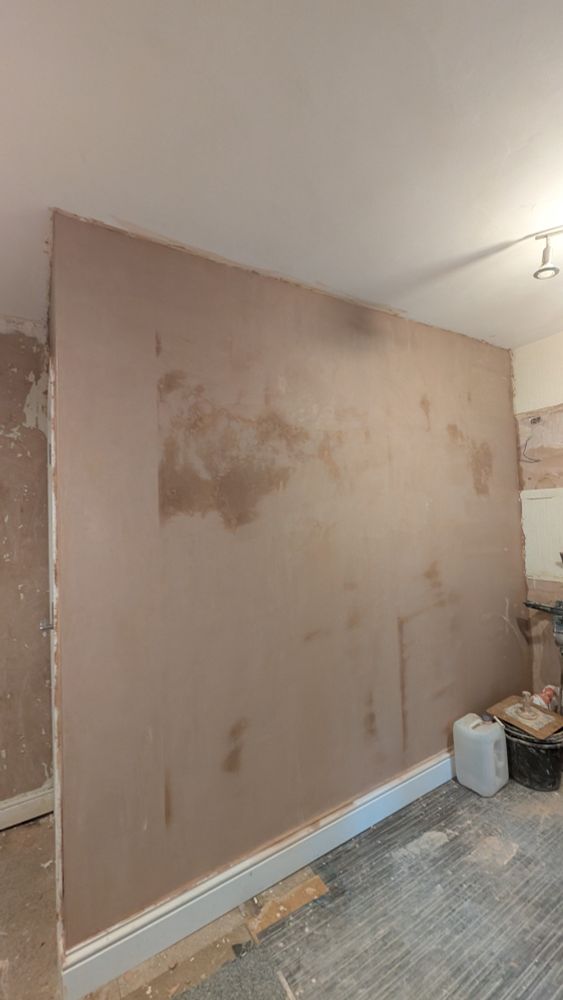 A freshly plastered wall inside a house 