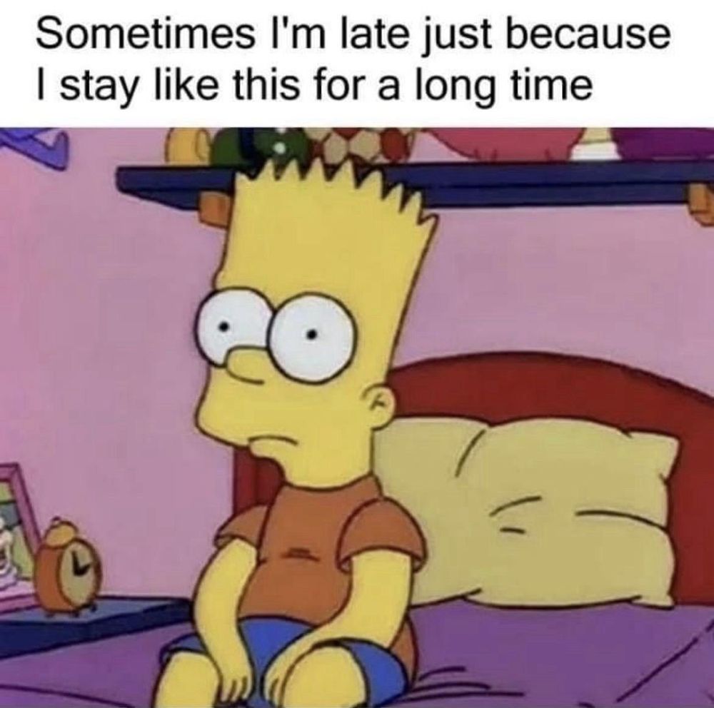 The image features Bart Simpson from "The Simpsons" cartoon series sitting on a bed with a blank expression. Above him, text reads "Sometimes I'm late just because I stay like this for a long time," humorously suggesting procrastination or a lack of motivation.