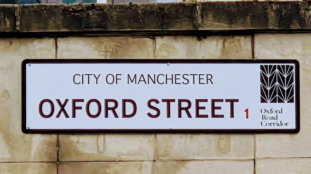Modern replacement, showing new Oxford Road Corridor branding.