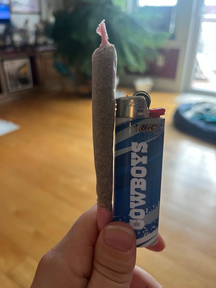 A bat sized blazy Susan joint next to a Cowboys lighter for size reference (no I could not name a single Dallas Cowboy for the life of me)