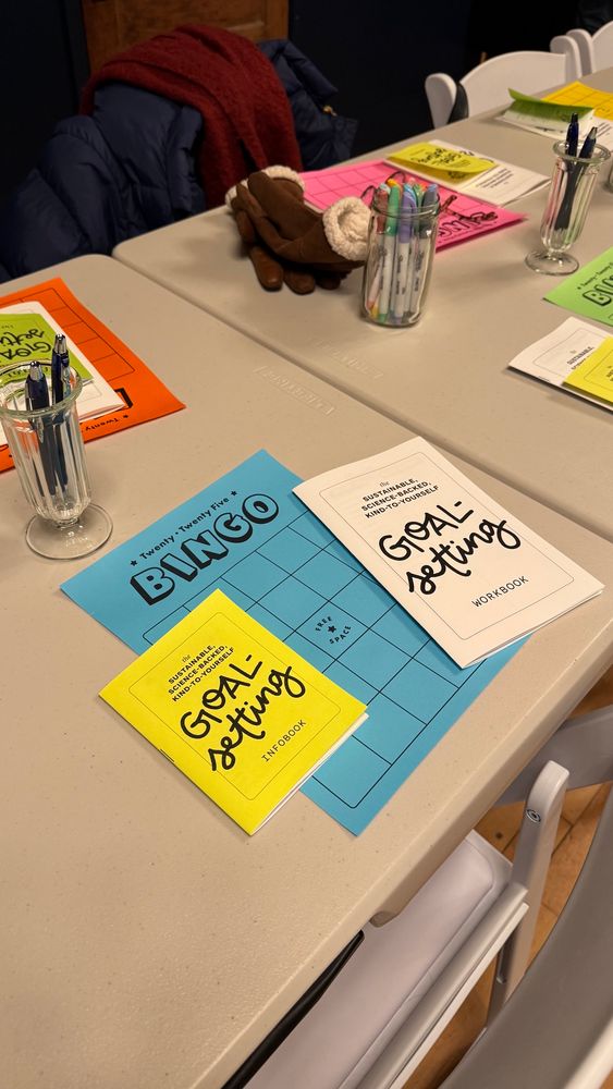 two zines focused on goal-setting (1 quarter-page information booklet and 1 half-page workbook) and an empty 2025 bingo card