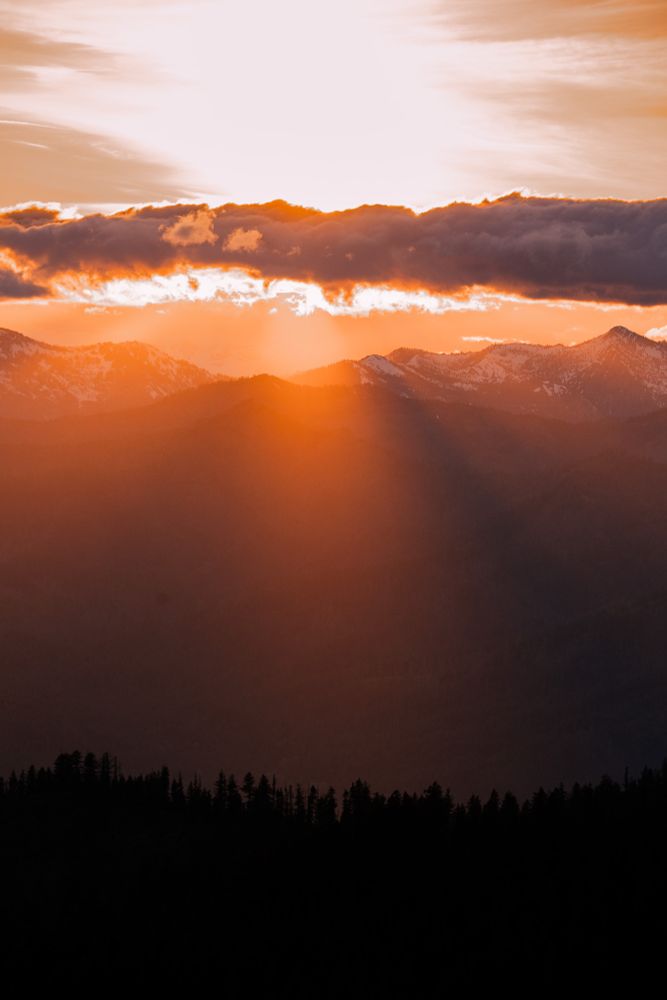 An orange sunset over the mountains.