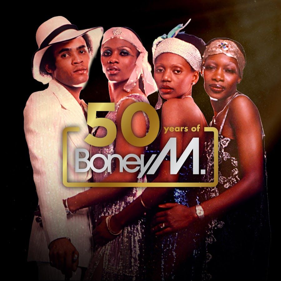 Four members of Boney M (three women and a main) in flamboyant stage outfits, the man in a panama hat and the women in glittering headbands. The logo reads "50 years of Boney M."