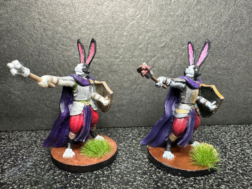 The first time I painted him (left) vs the one I recently painted (right).