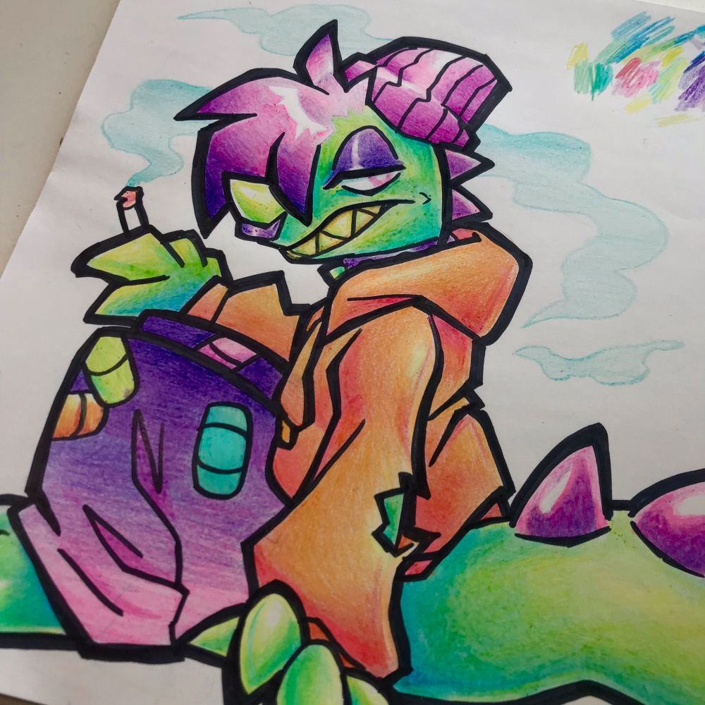 A crayon and marker drawing of a bright green dinosaur with purple spikes wearing a pink beanie, orange hoodie, and purple/pink pants