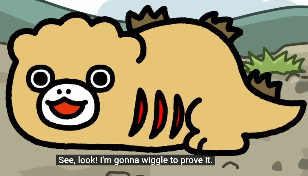 Chibi Godzilla in his second form, resembling Shin Godzilla's second form. Caption reads: "See, look! I'm gonna wiggle to prove it."