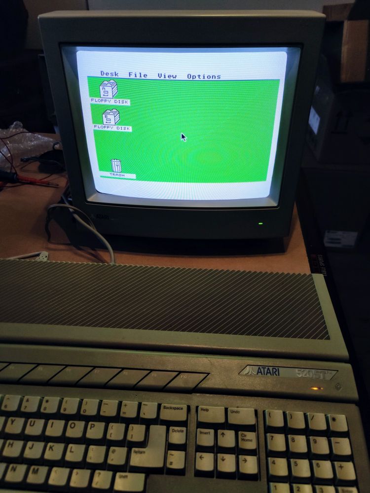 Atari ST computer displaying on newly fixed Atari monitor