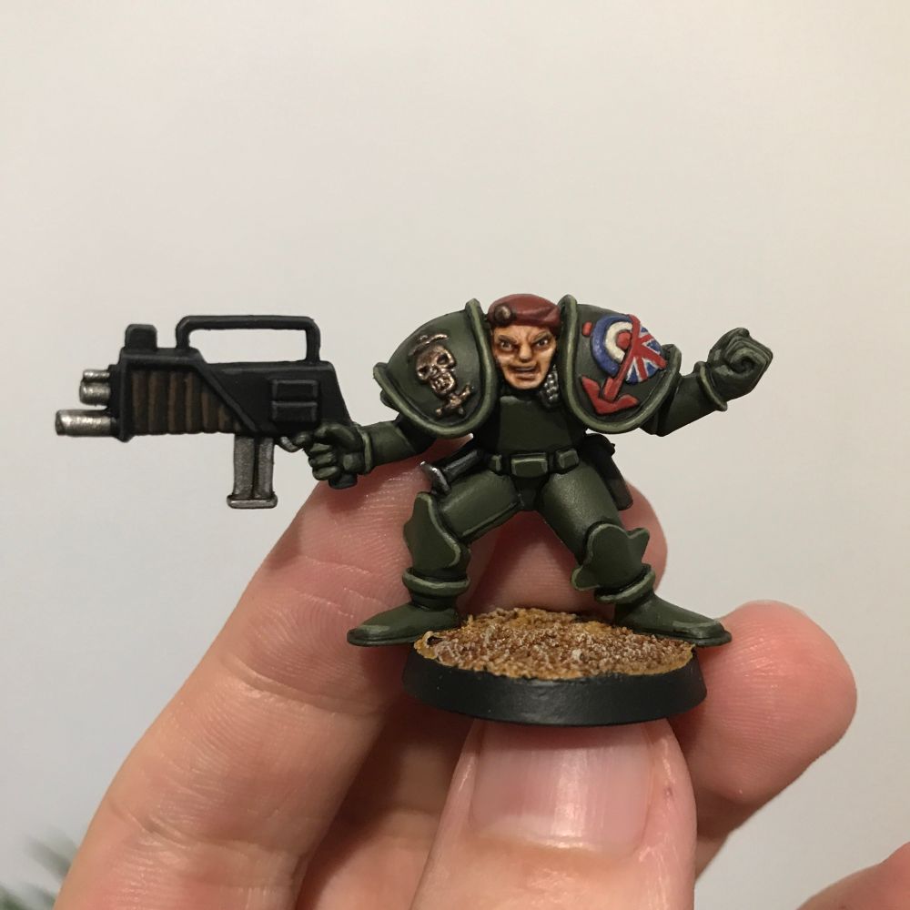A Blood Beret miniature from the board game of the same name. Everything about his pose and proportions are a little strange.