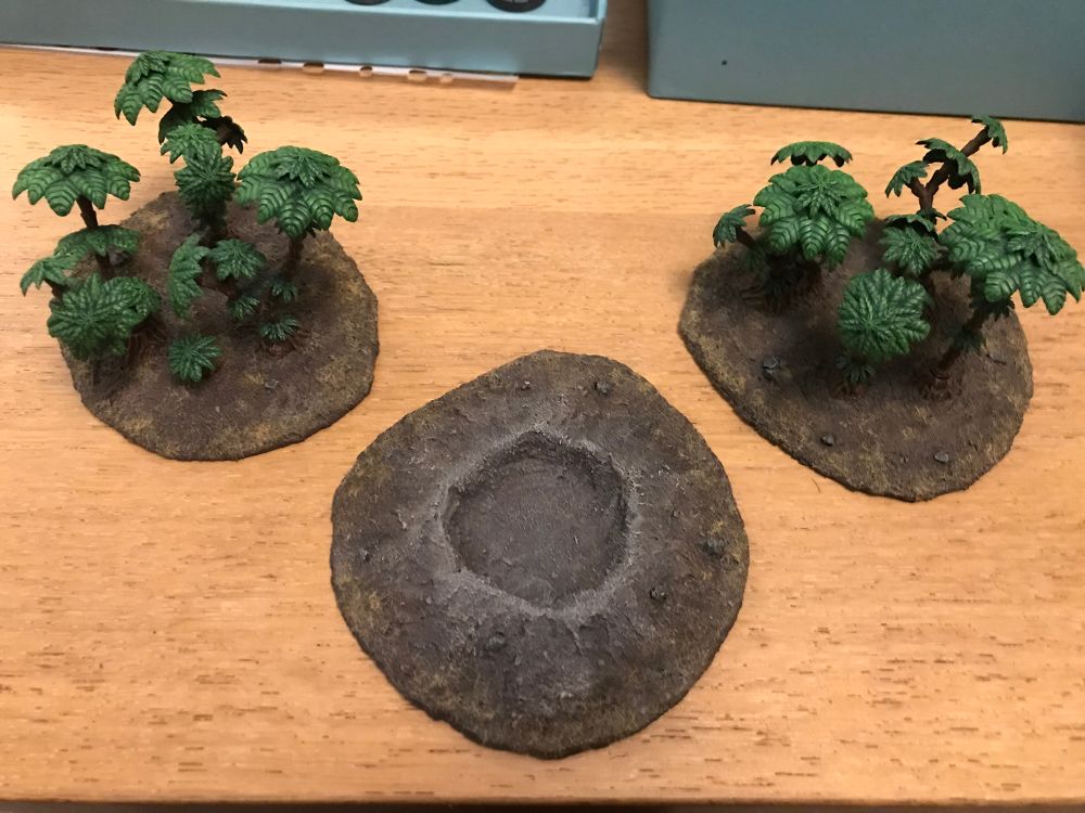 2 sets of trees and a homemade crater.