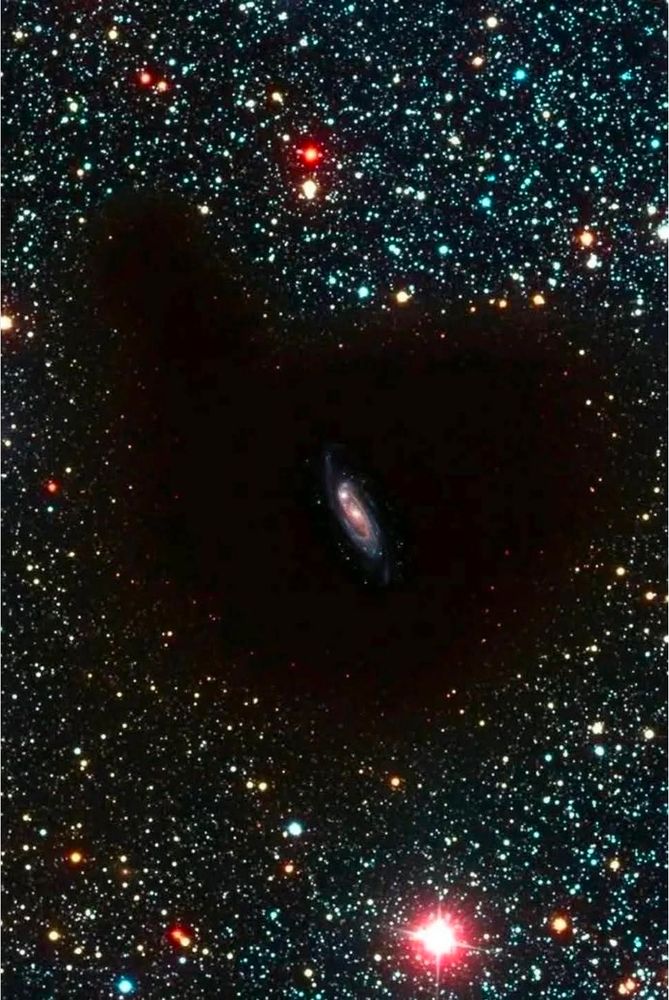 Earth may be trapped in a giant void in space say scientists. 