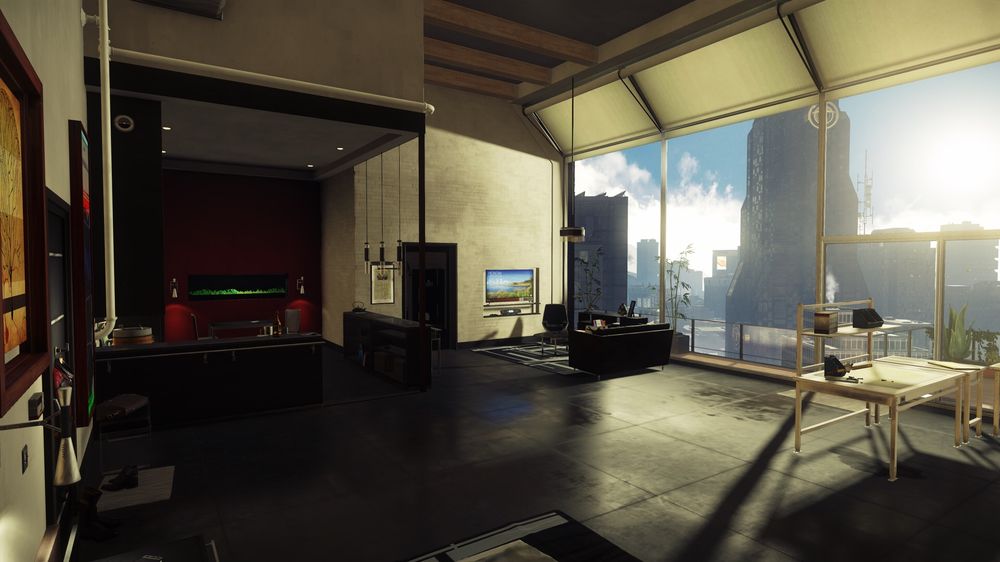 A view of Morgan Yu's two room apartment and its skyline view with the Monday morning sun shining through the windows, with a kitchen in the back left, sitting area and bathroom in the back, and a workspace partially visible to the right.