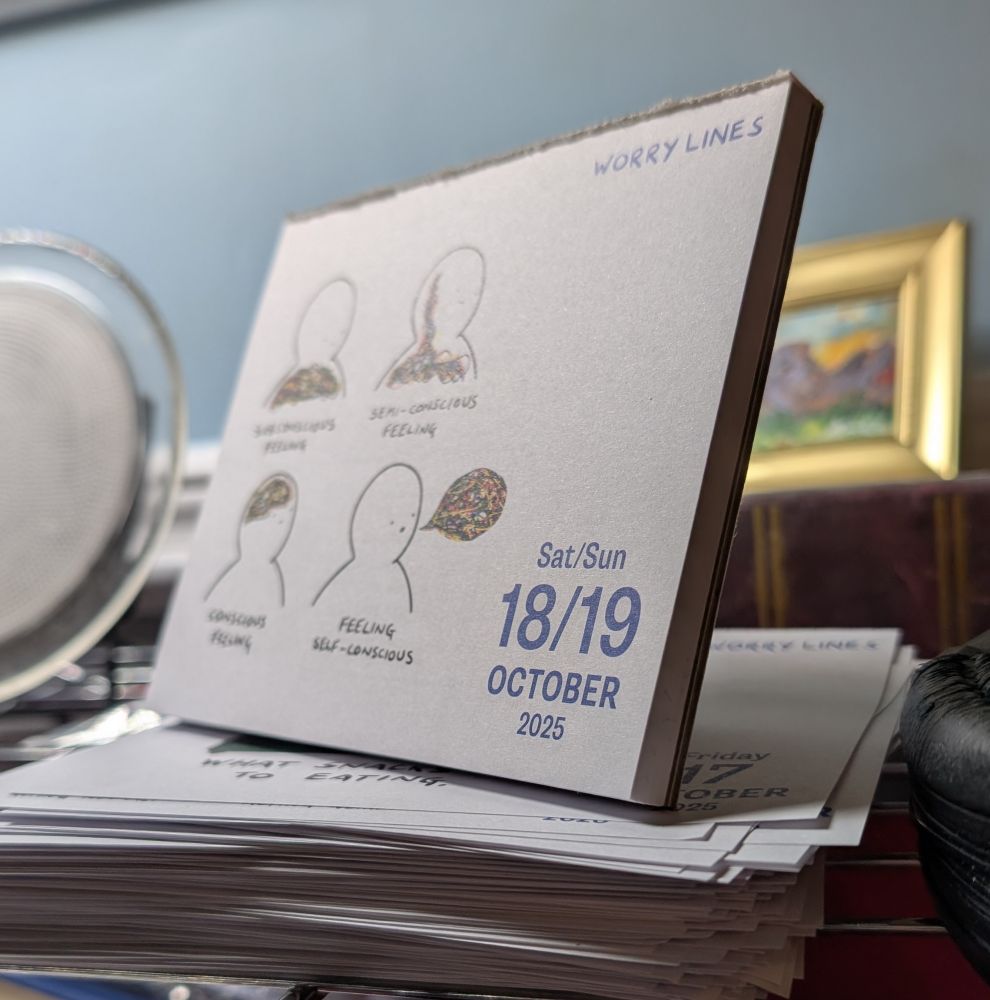 A Worry Lines calendar on top of a pile of discarded days. 