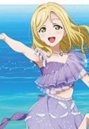The character Mari Ohara wearing a delicate light purple outfit with ruffles and sheer details, resembling a sea-inspired costume. In the background, you can see the blue ocean.