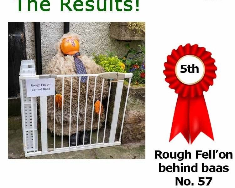 A big round "sheep" with a blue tie and a bright orange ball for a head in the image of Donald Trump sat behind a baby gate on the roadside. The title is "Rough Fel'on Behind Bars"