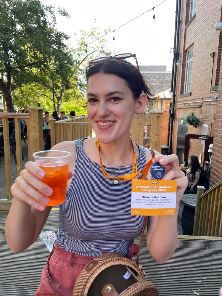 Me with my IMC lanyard and an aperol spritz