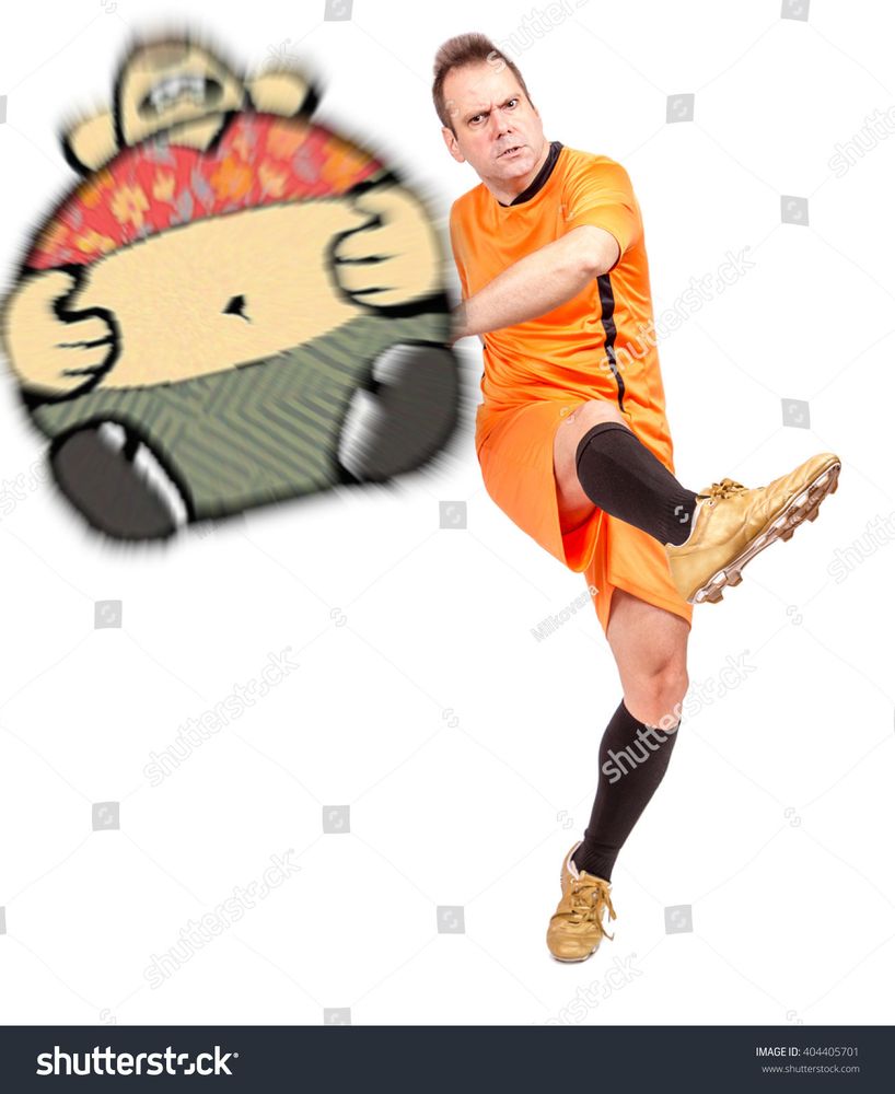 International football player in orange uniform field kicks the inflated big and round Stahli