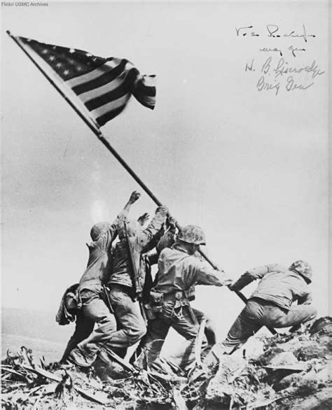 Raising the flag WWII photo