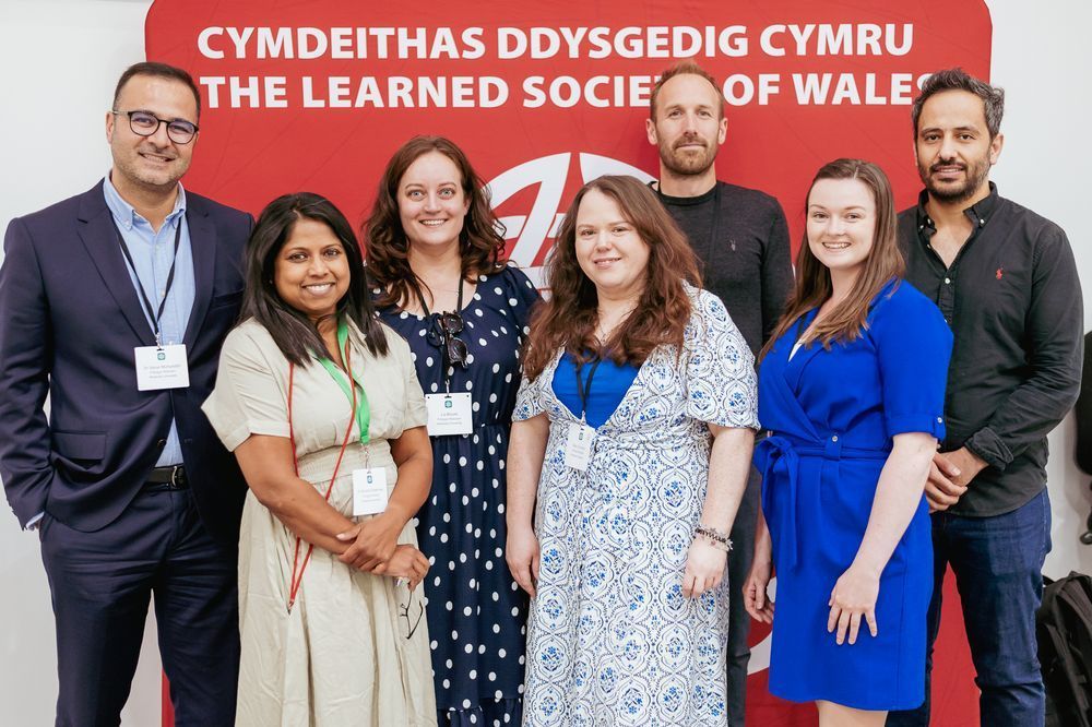 wrexham researchers smiling at camera