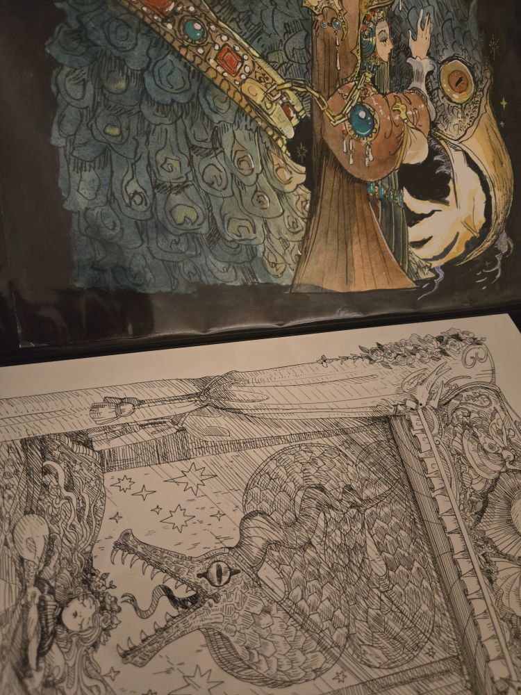 Snippet of original drawings and paintings in my binder!