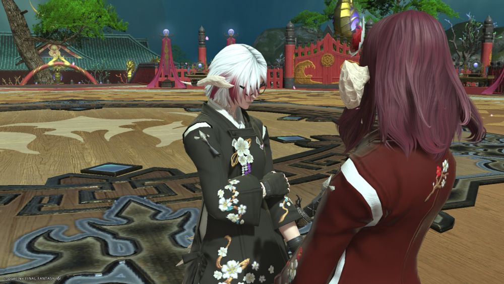 Erika and Kurenai once again. Kurenai is facing away from the camera towards Erika who looks despondent. They are wearing matching dresses with Kurenai's being red and Erika's being black. 