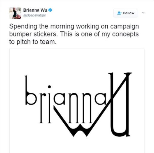 2017 screencap from Twitter that reads:

Brianna Wu, @Spacekatgal “Spending the morning working on campaign bumper stickers. This is one of my concepts to pitch to team”

Underneath is an illegible logo in thin weight, all lowercase letters that interweave clumsily, the letter “U” in her last name being inexplicably the largest, most prominent part of the whole design, so the whole thing looks like you threw water at it, and now the ink is running down the page by accident
