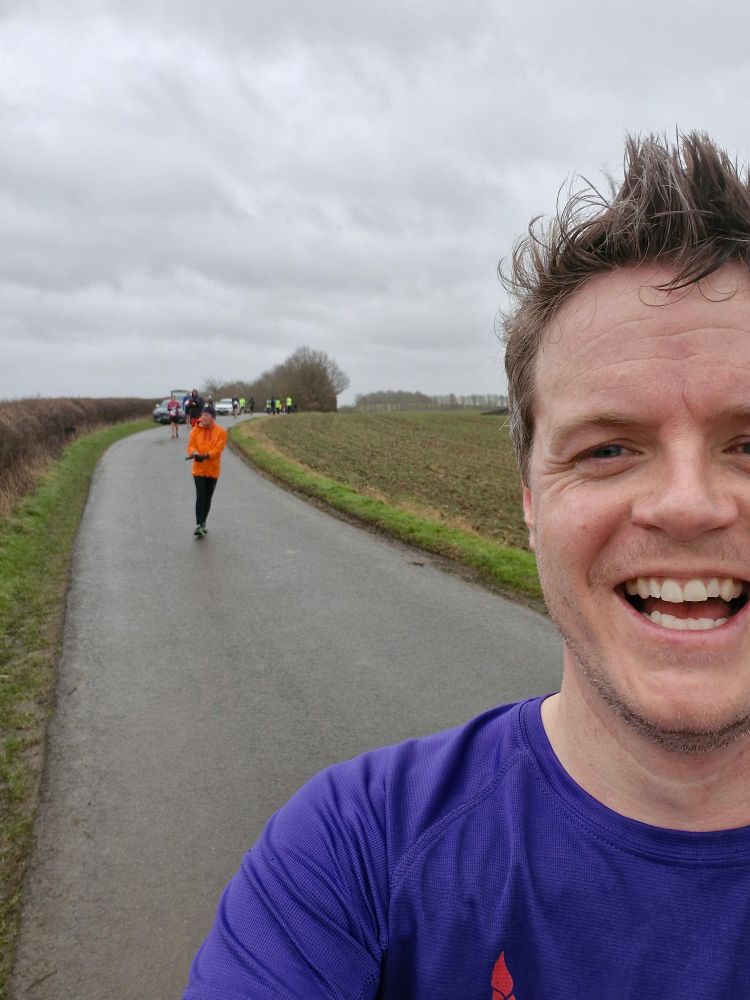 Selfie with smiley face having run Shipston IX in very windy conditions. Picture taken in Fell Mill Lane just outside of Shipston on Stour.
