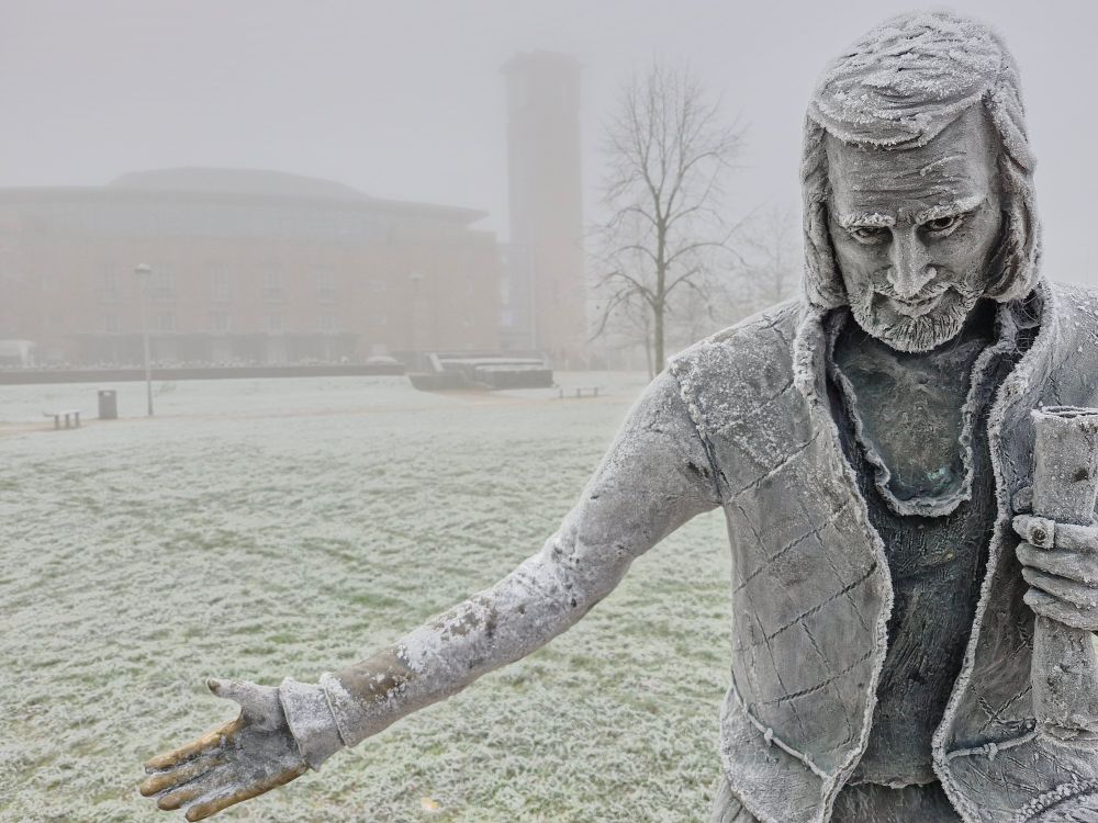 Shakespeare statue covered in frost in the Bancroft gardens in Stratford upon Avon.