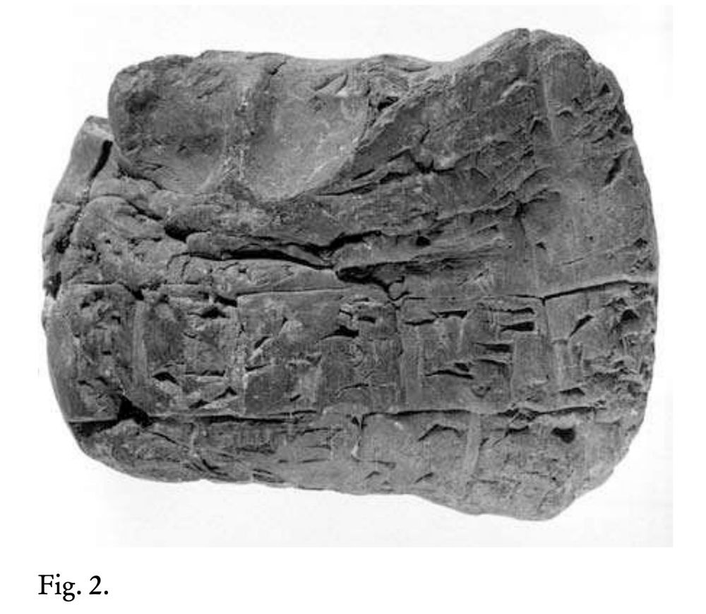 A cuneiform tablet crushed by an ancient scribe, with fingerprints