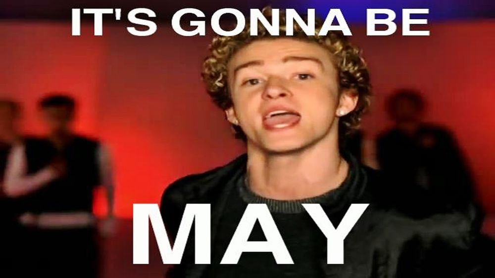 Justin Timberlake sings some song from guess N*Sync? I always get them confused with the Backstreet Boys, but never New Kids on the Block or Menudo. Respect your elders. So this picture is him in a music video I think and he's singing a lyric that he rather angrily insists is "it's gonna be me" but if you listen to it he very clearly pronounces it "may". I mean, he is obviously saying "me" because "may" doesn't make sense in the context of the song, and he's doing that vocal thing where he makes it sound like "May" which you are hearing in your head right now if you are of a certain age. So why get so mad about it, Justin? So many people love this silly meme and you could be like "yeah, dog, I totally said it like that and I love that you can have fun with it once a year. word. dope."

I think the rest of the band is out of focus behind him and also the wall is red. To be honest, J-dog here really pops against the backdrop, and the lighting is super flattering. So, yeah, dude, it's gonna be you, but it's also gonna be May. Tomorrow, like this meme says.