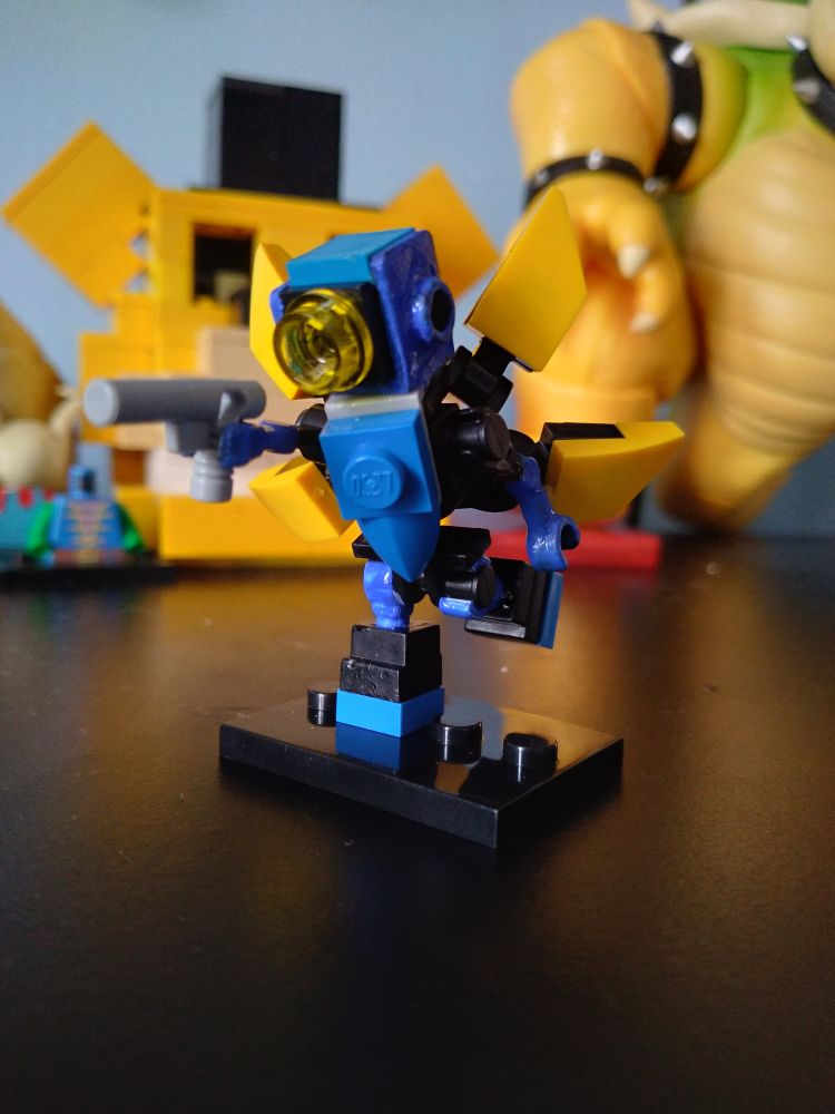 I made the head with painted blue neck brackets to wrap around the head.