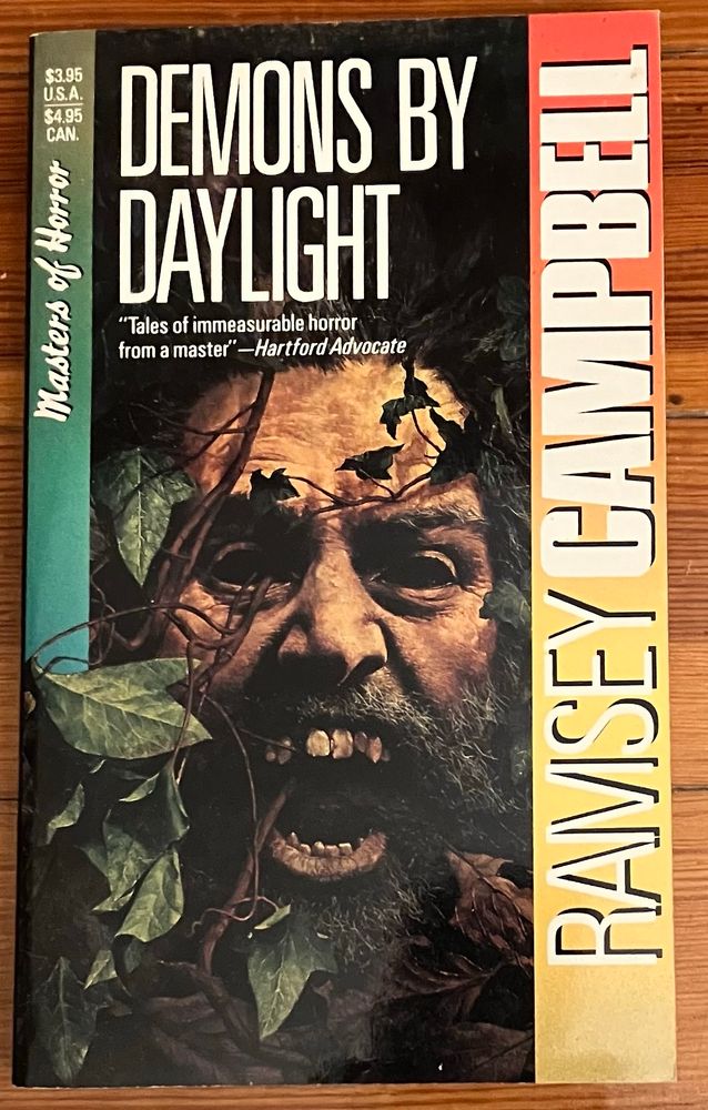 Paperback book cover for the Caroll & Graf edition of Ramsey Campbell’s Demons By Daylight. 