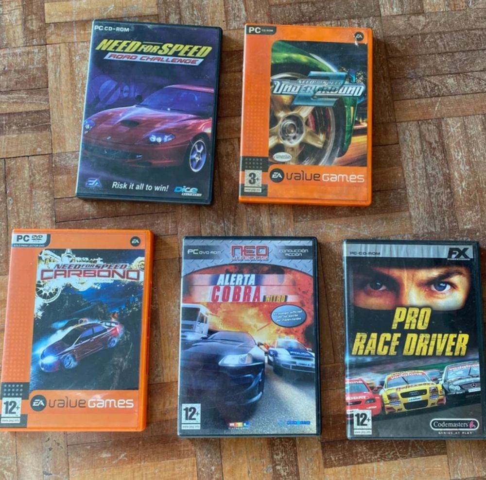 Picture of a second hand deal of five PC racing games, Need for Speed Underground 2, NFS Carbono, NFS Road Challenge, Pro Race Driver and Alerta Cobra. (Alarm für Cobra 11 – Die Autobahnpolizei)