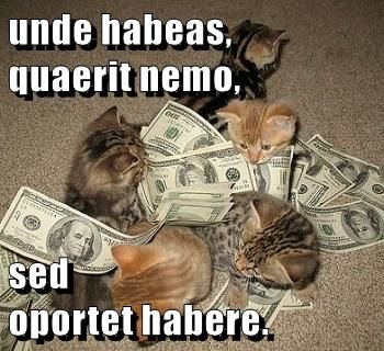 Kittens playing with paper money. Text: Unde habeas, quaerit nemo sed oportet habere.