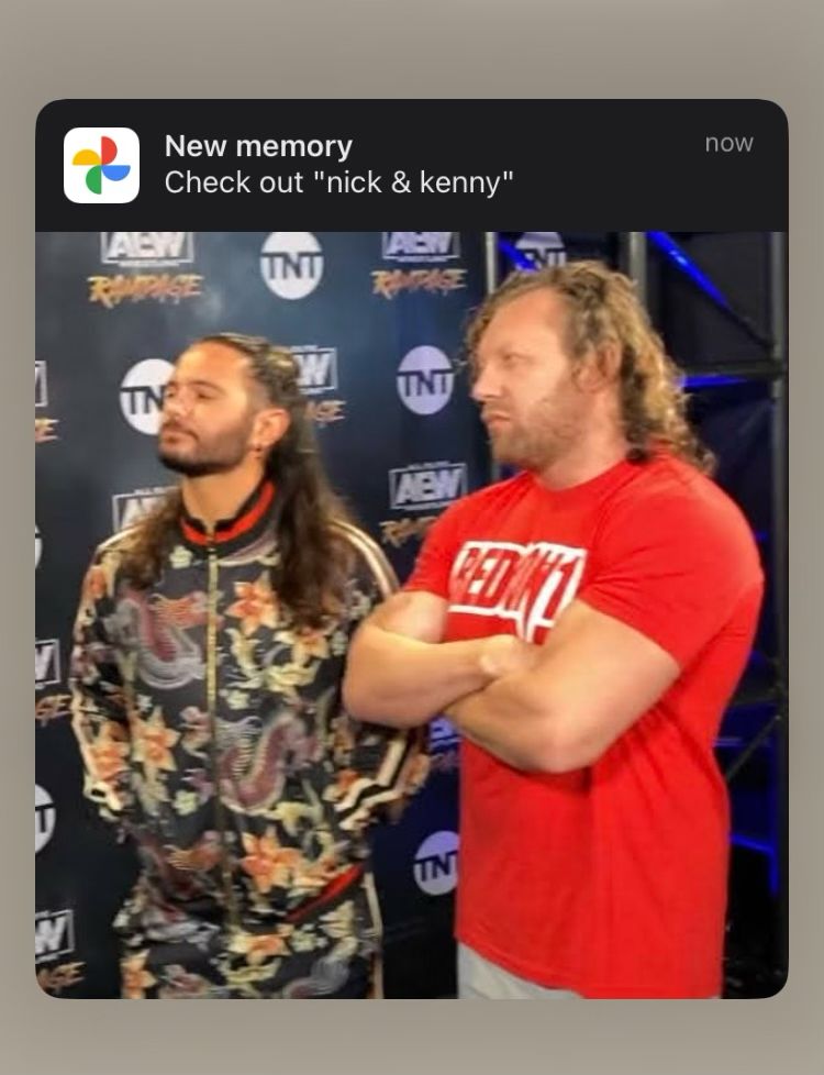 screenshot from google photos wirh the display name “New Memory: Check out “nick & kenny”, but it’s actually a pic of matt jackson (left) and kenny omega (right) 