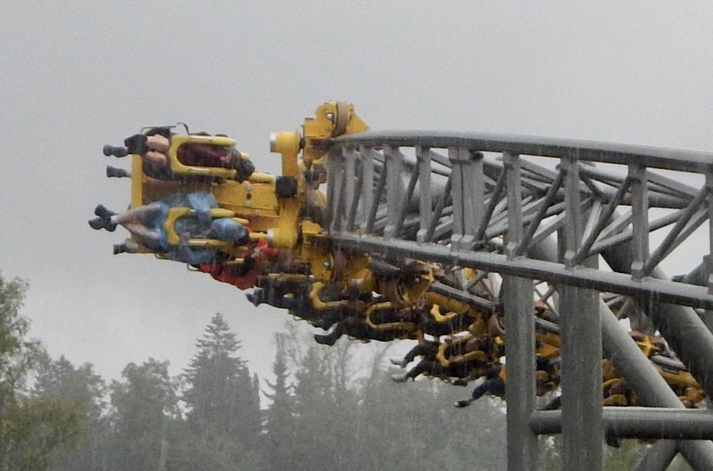 people riding the Tornado rollercoaster in pouring rain