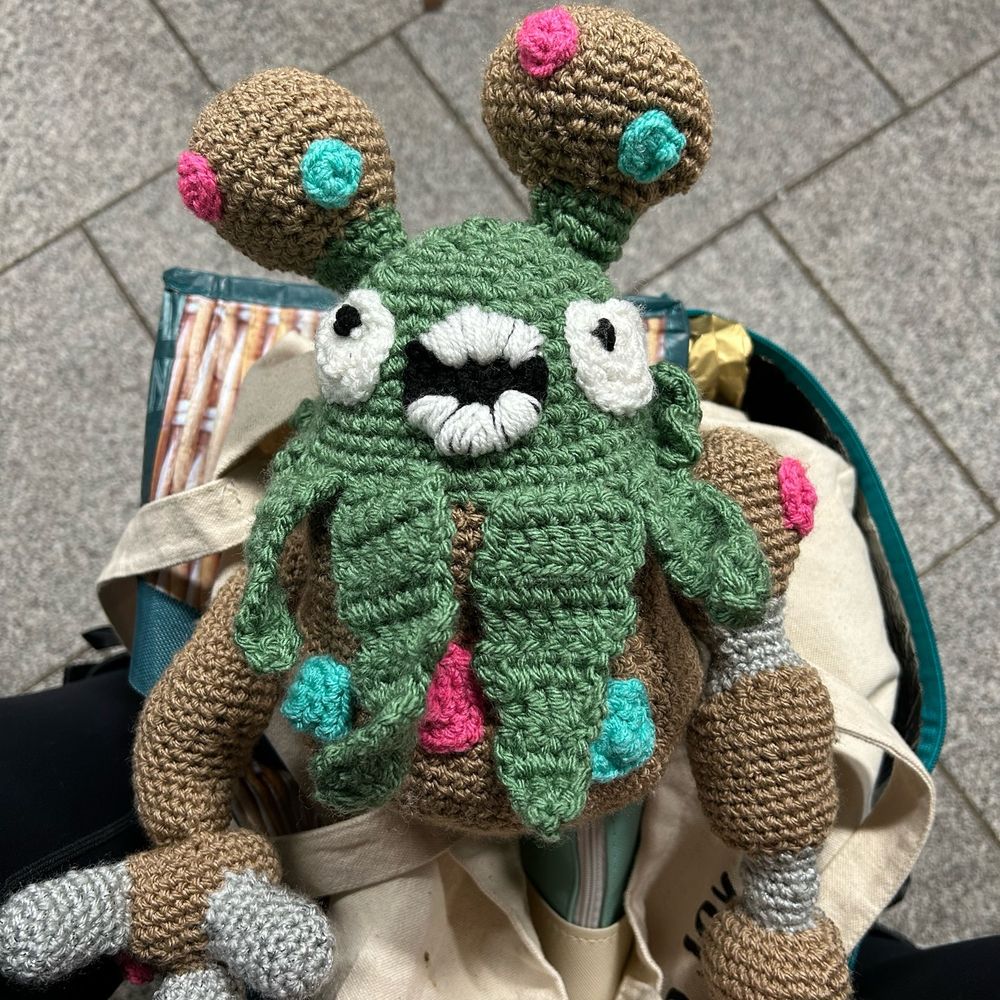 A crochet plush of Garbodor 
