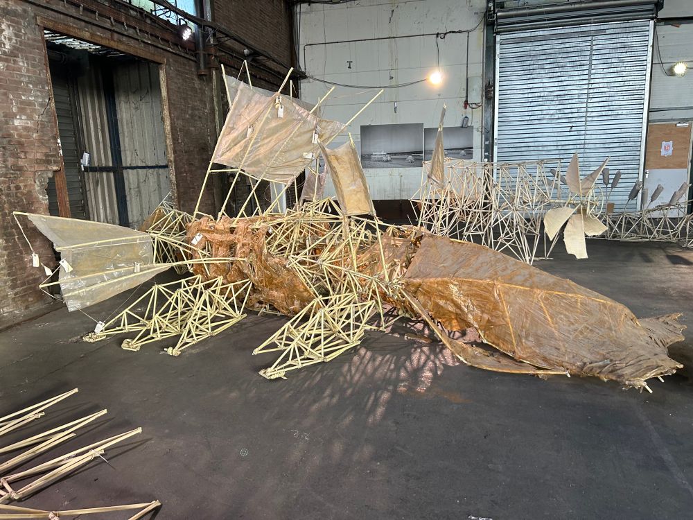 A strandbeest that looks like a fish half decomposed on the floor