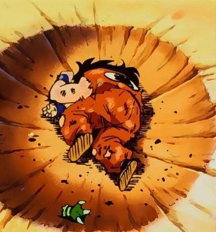 A still from Dragonball Z. Yamcha lays in a crater, in a death pose.