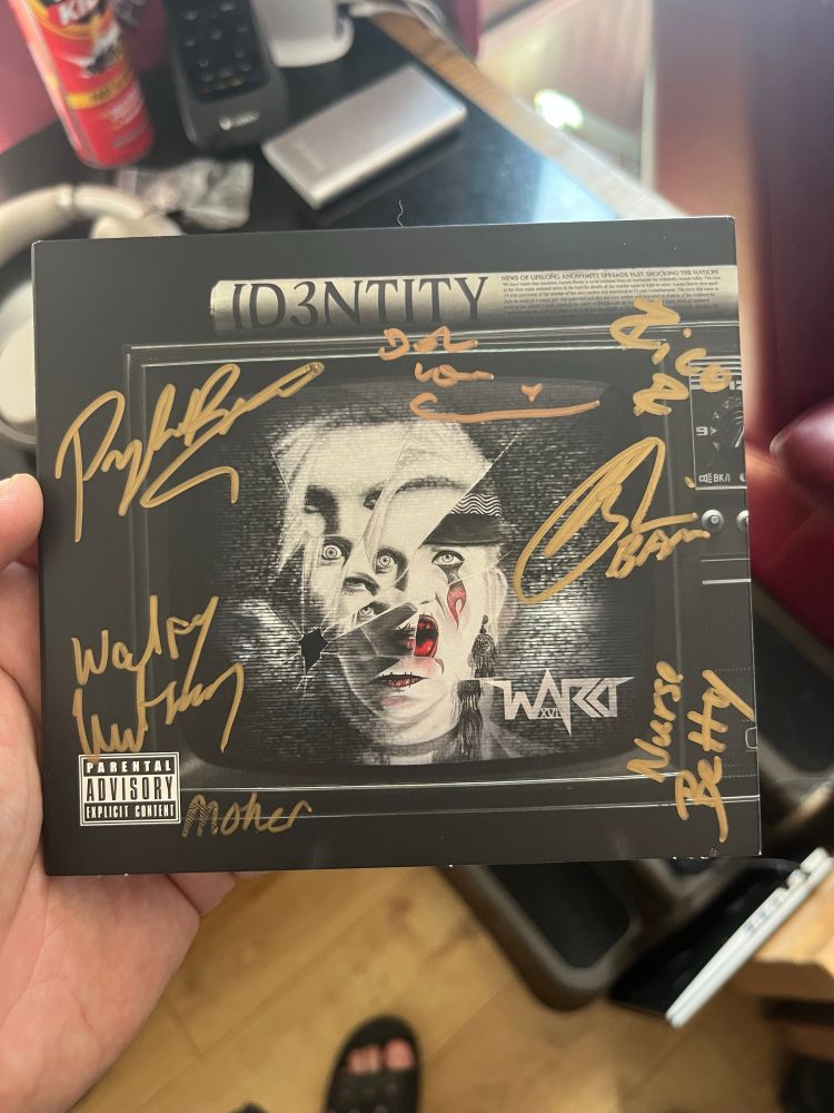 Cover of Ward XVI’s third album Id3ntity signed by the band