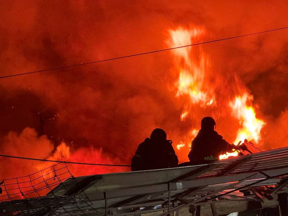 rescuers putting out flames