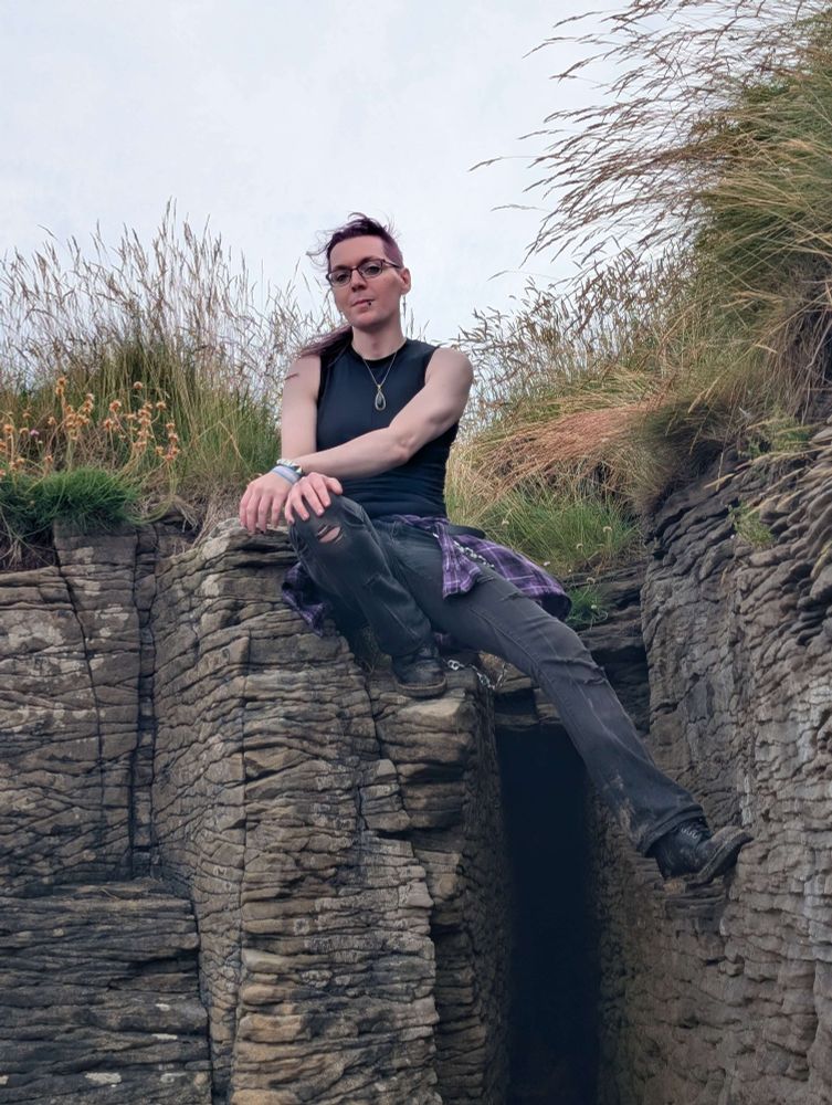 Luci looking a little windswept perched on some cool rocks.