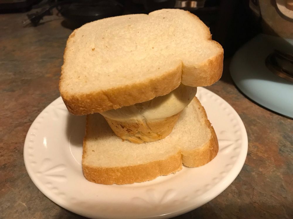 A homemade mince pie between two slices of white bread. It’s not quite a Wigan kebab. 