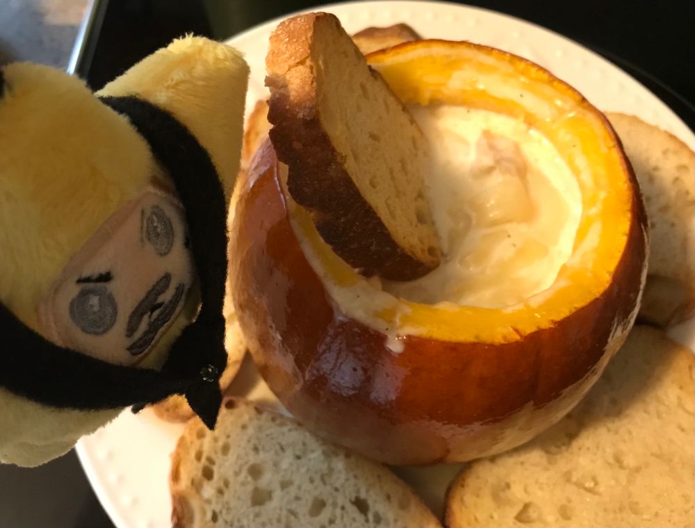 Starzzy is eagerly going for the first taste of the fondue. 