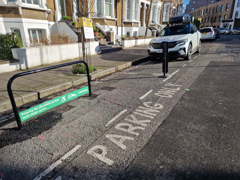 Cargo bike parking in a parking bay on a steeet