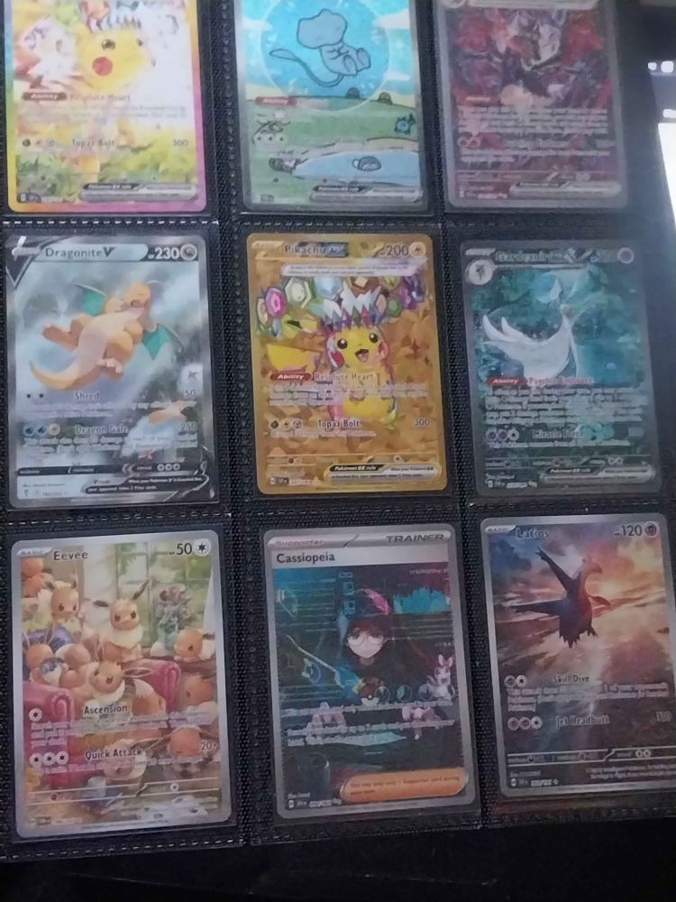 First page of a Pokemon TCG Binder featuring the most expensive cards I have pulled