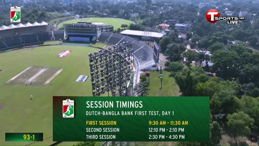 graphic showing session times for the Bangladesh v Ireland test match from Sylhet International Cricket Stadium (backing image is a drone shot looking toward one side of the stadium with the surrounding landscape and the outer oval in the background)

first session 9:30a - 11:30a
second session 12:10p - 2:10p
third session 2:30p - 4:30p