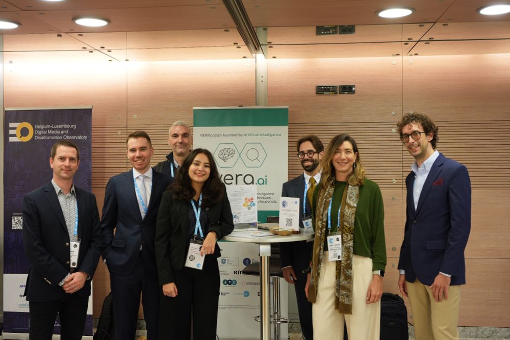 Team photo. Project members at project stand