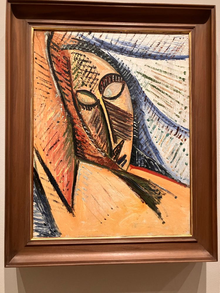 A painting by Pablo Picasso named The Head of a Sleeping Woman, depicting the head of a sleeping woman