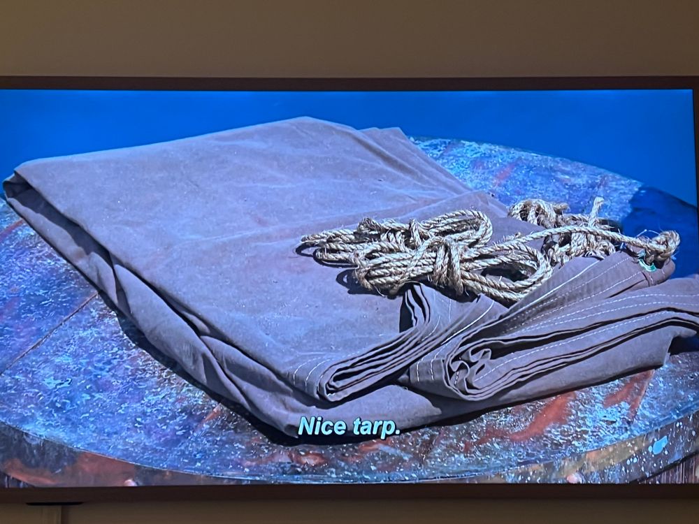 A shot of a tarp on Survivor with the caption “Nice tarp.”