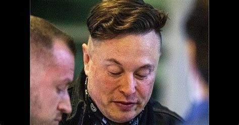Elon musk with his stupid ugly hair cut and an even stupider uglier face